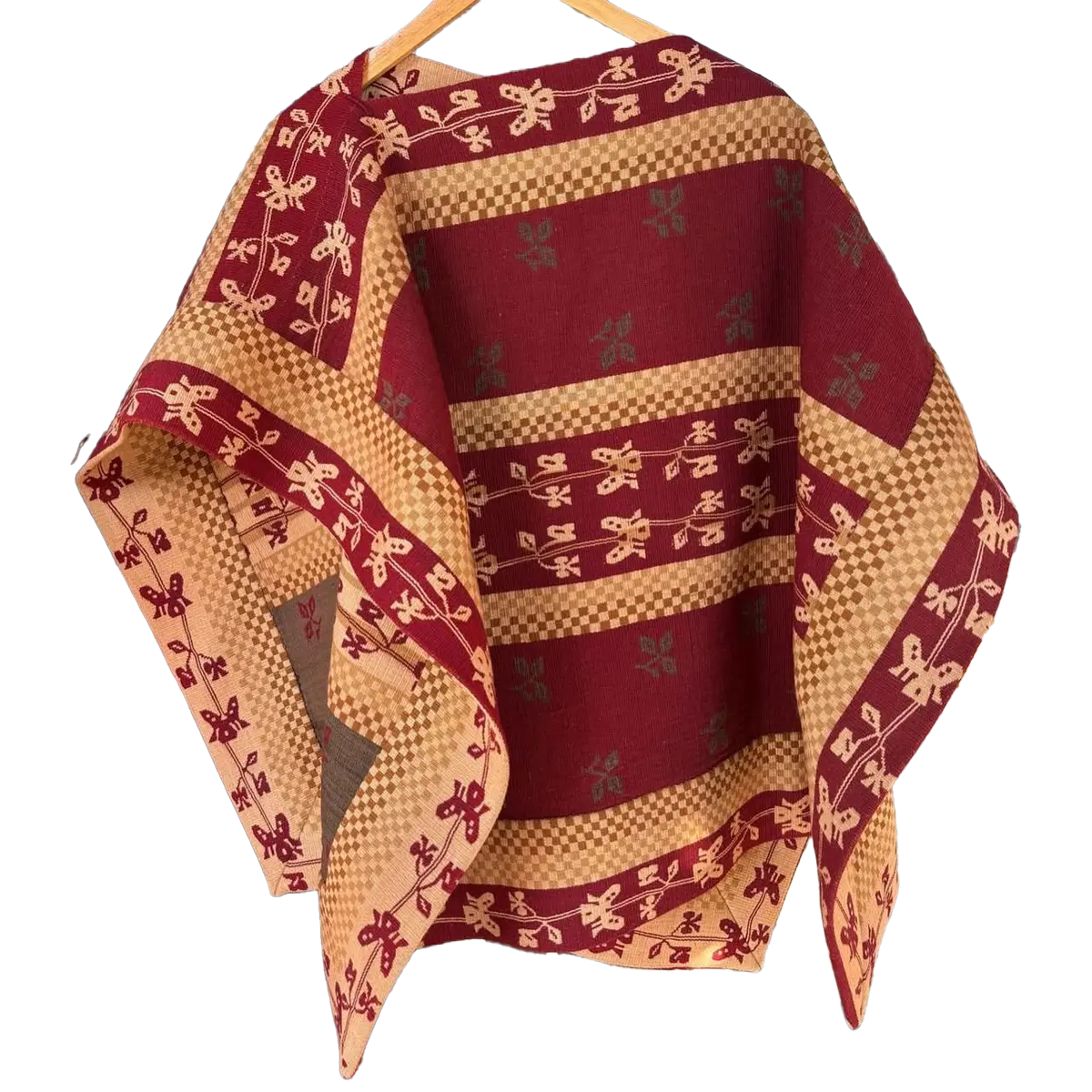 Chamanto de lana en tonos burdeos y beige con motivos tradicionales