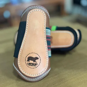 Canillera Suela Corta y Larga de Cuero – Protección de Alto Impacto